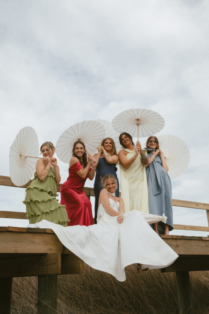 bridesmaids pose outside for charleston wedding