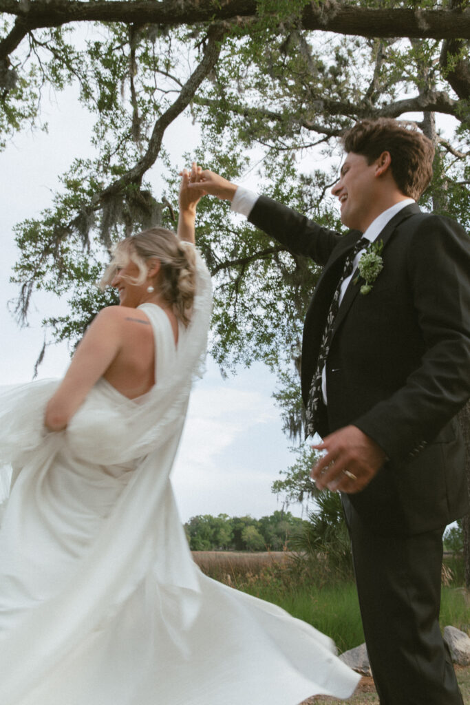 couple dancing outside charleston wedding venue