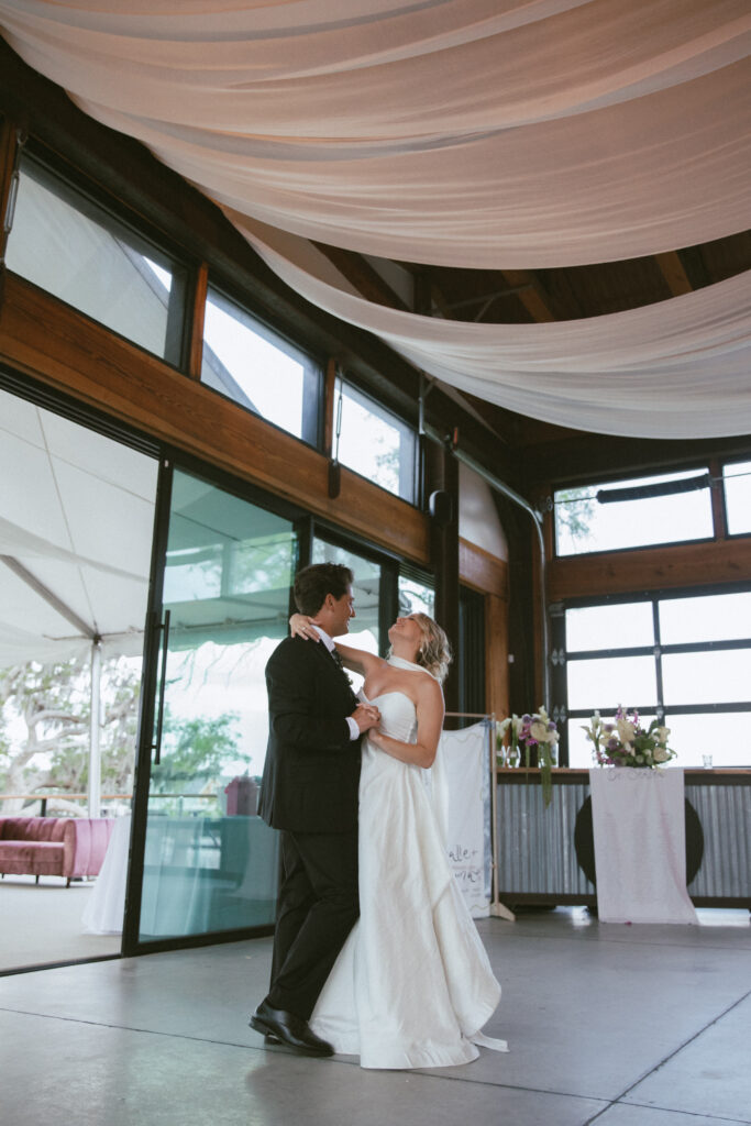 couple dancing under romantic draping in charleston